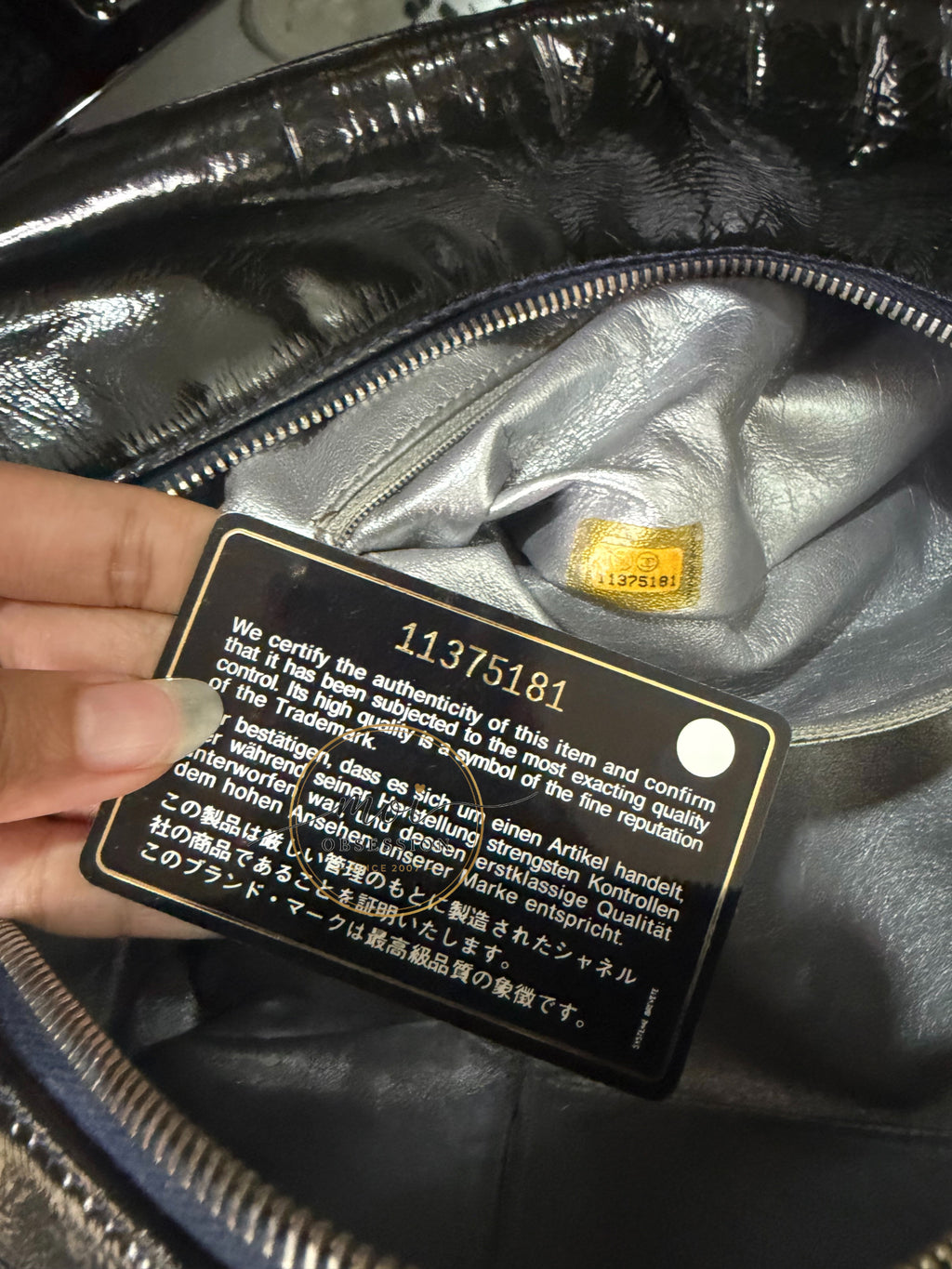 CHANEL Black Patent Leather LUXE LIGNE  Bowler Bag pre-owned with card