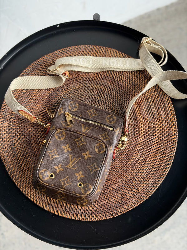 Louis Vuitton Monogram Utility Phone Sleeve. PHP 99,000