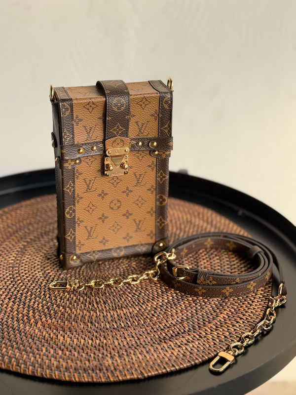Louis Vuitton Monogram Reverse Canvas Vertical Trunk Pochette Bag. PHP100,000